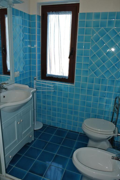 Case Vacanza Fenicotteri San Teodoro  Kamer foto